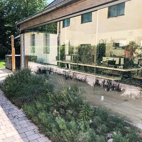 Панорамне розсувне скління SLIDING NEXT ALL GLASS без верхнього профілю